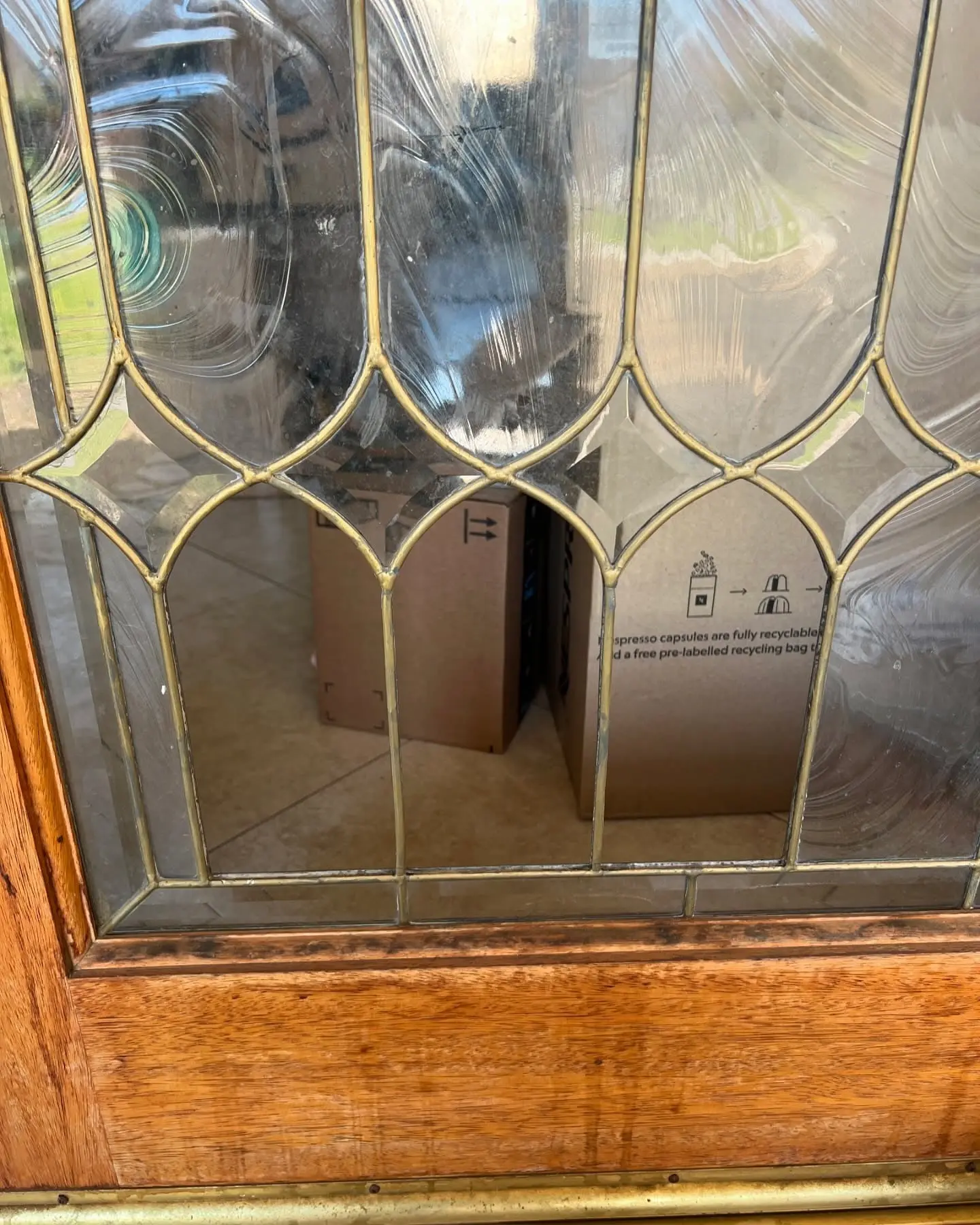 Decorative glass panel set in a wood door