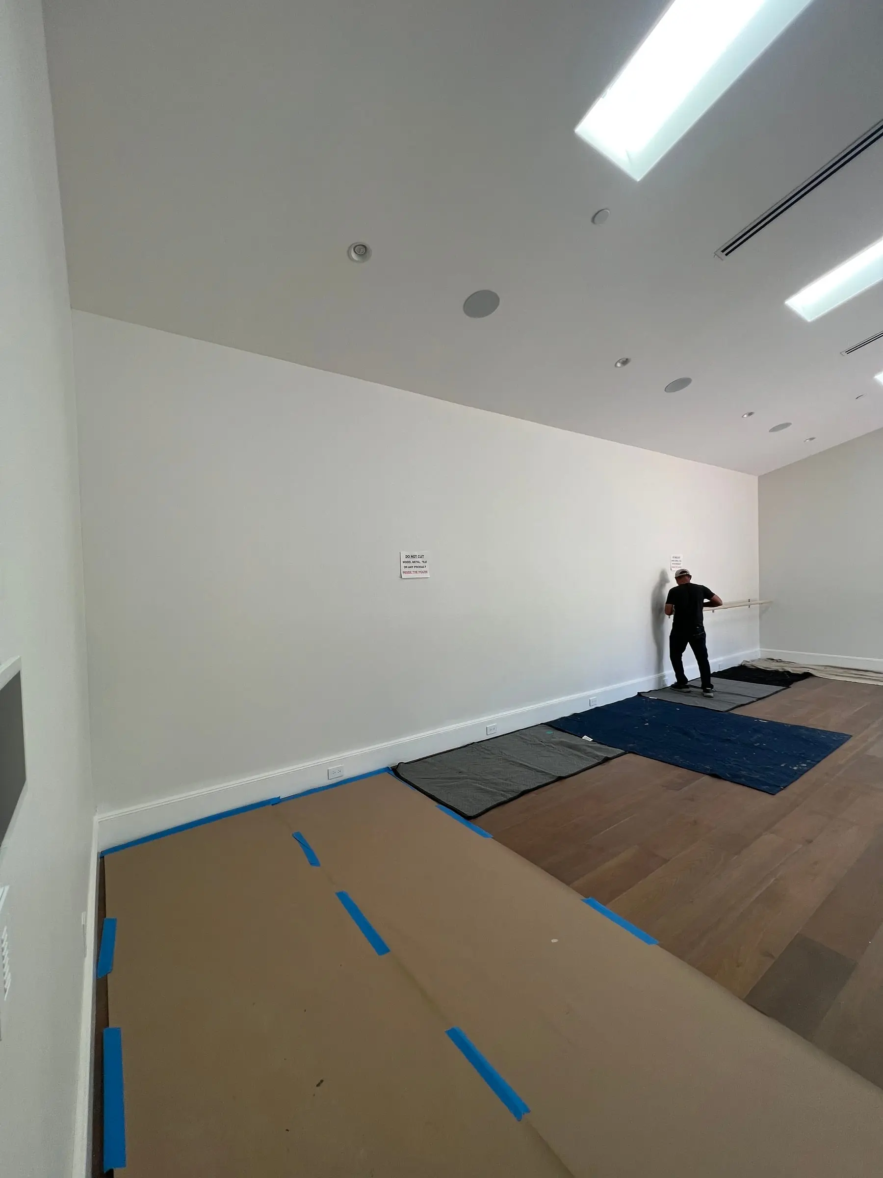 Gym wall before a mirror wall installation